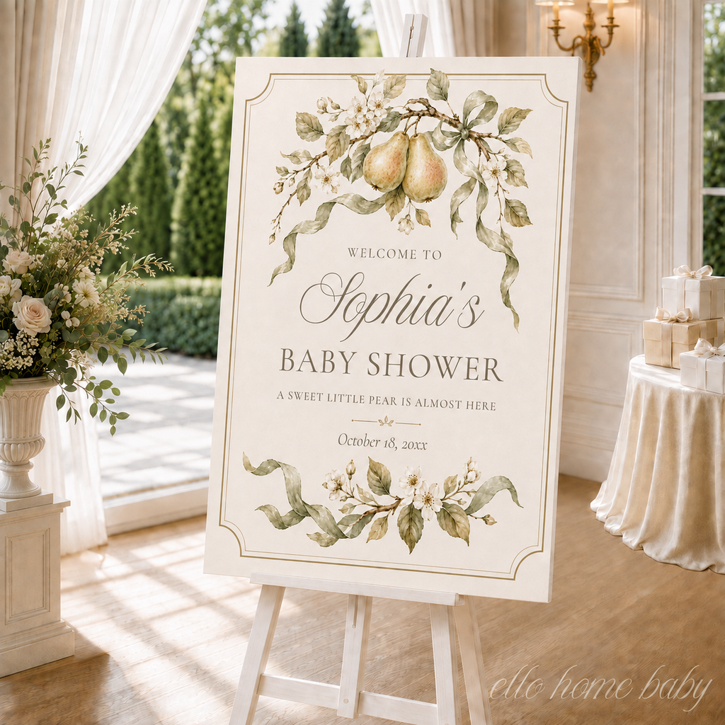 Personalized sweet little pear baby shower welcome sign with watercolor blossoms and sage ribbon displayed on an easel.