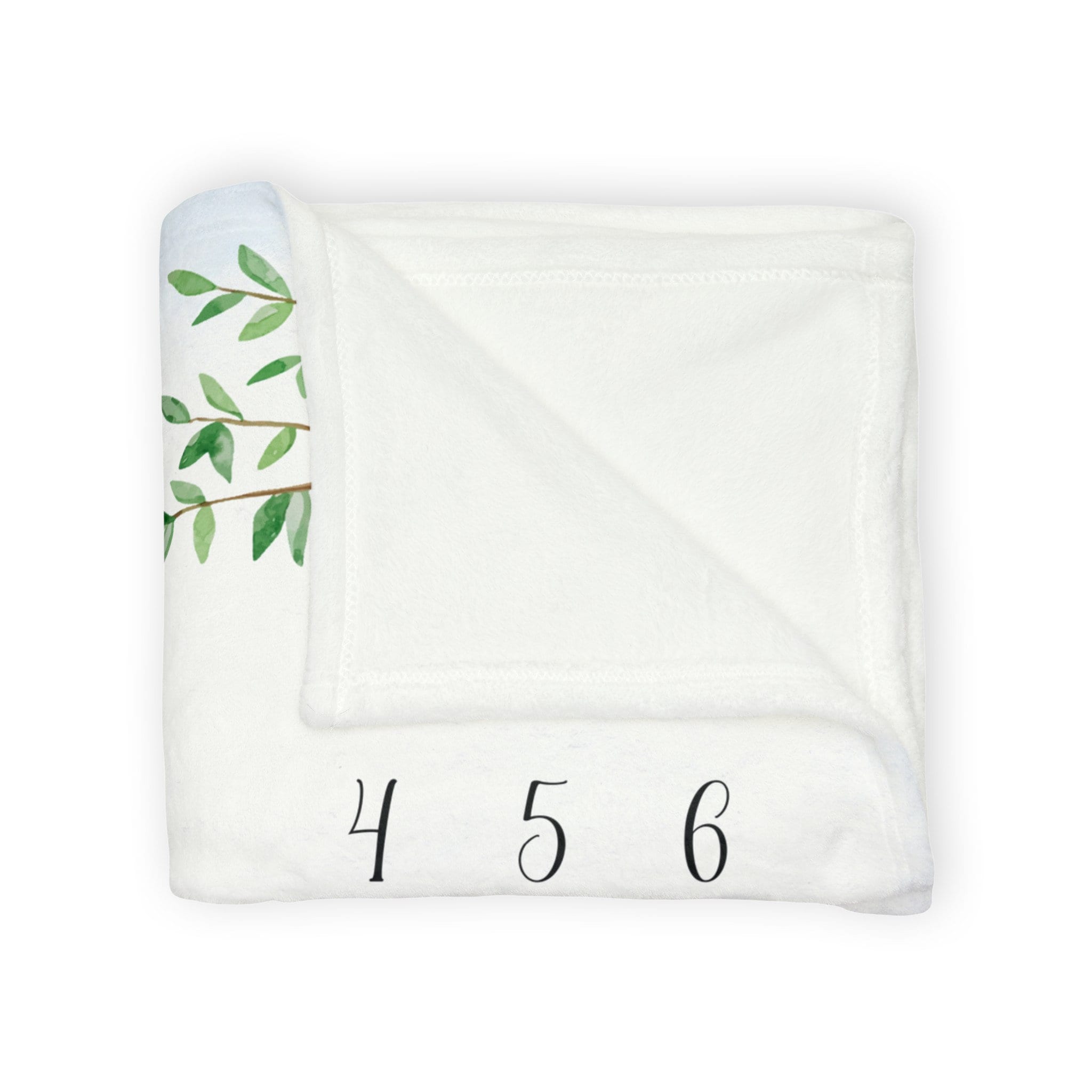 White with blue watercolor illustration teddy bear baby blanket folded over to show the soft fluffy texture of the minky fleece material.