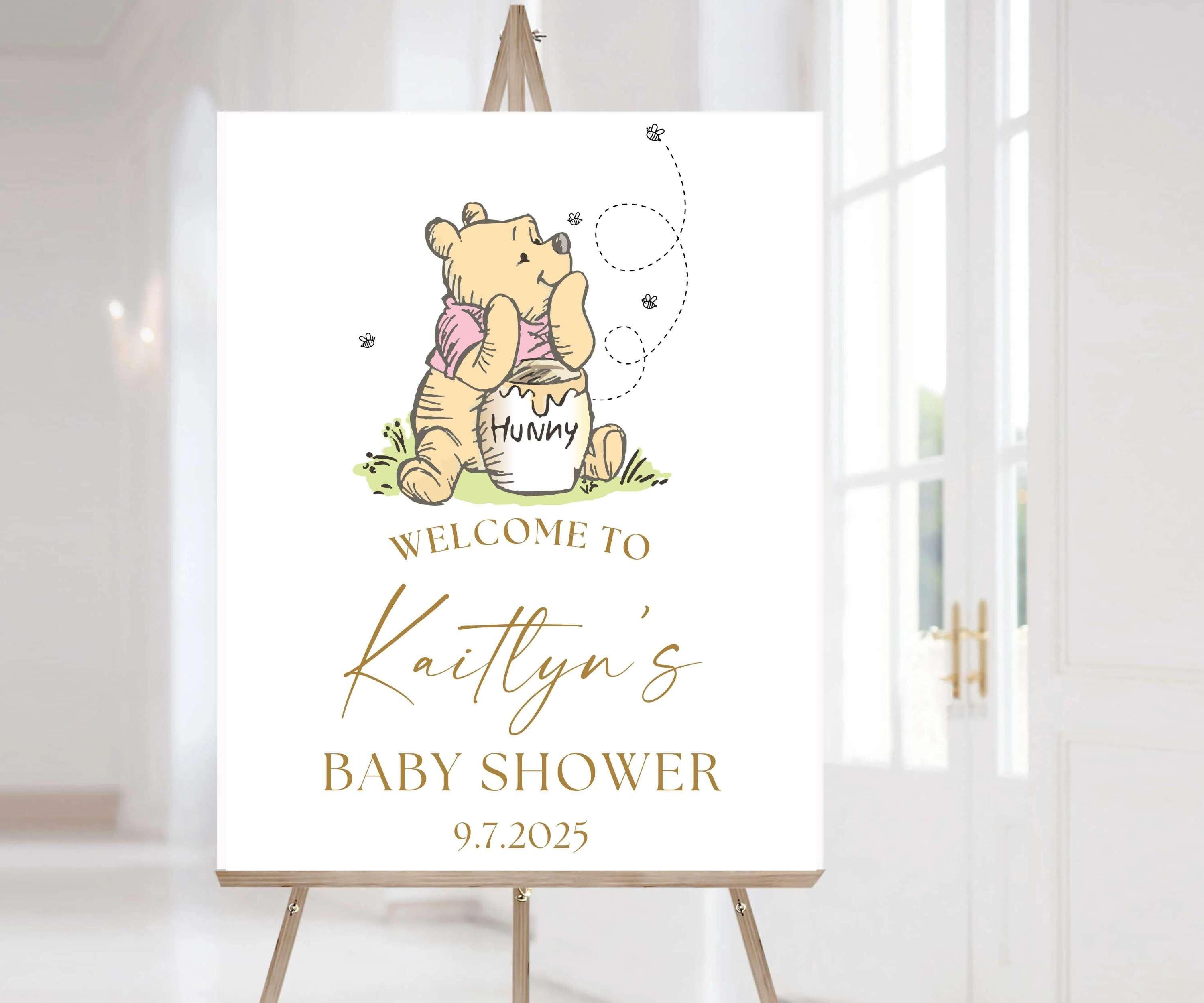 Another option available is pooh bear with a pink shirt placed on top with gold text. Baby shower or first birthday welcome sign.