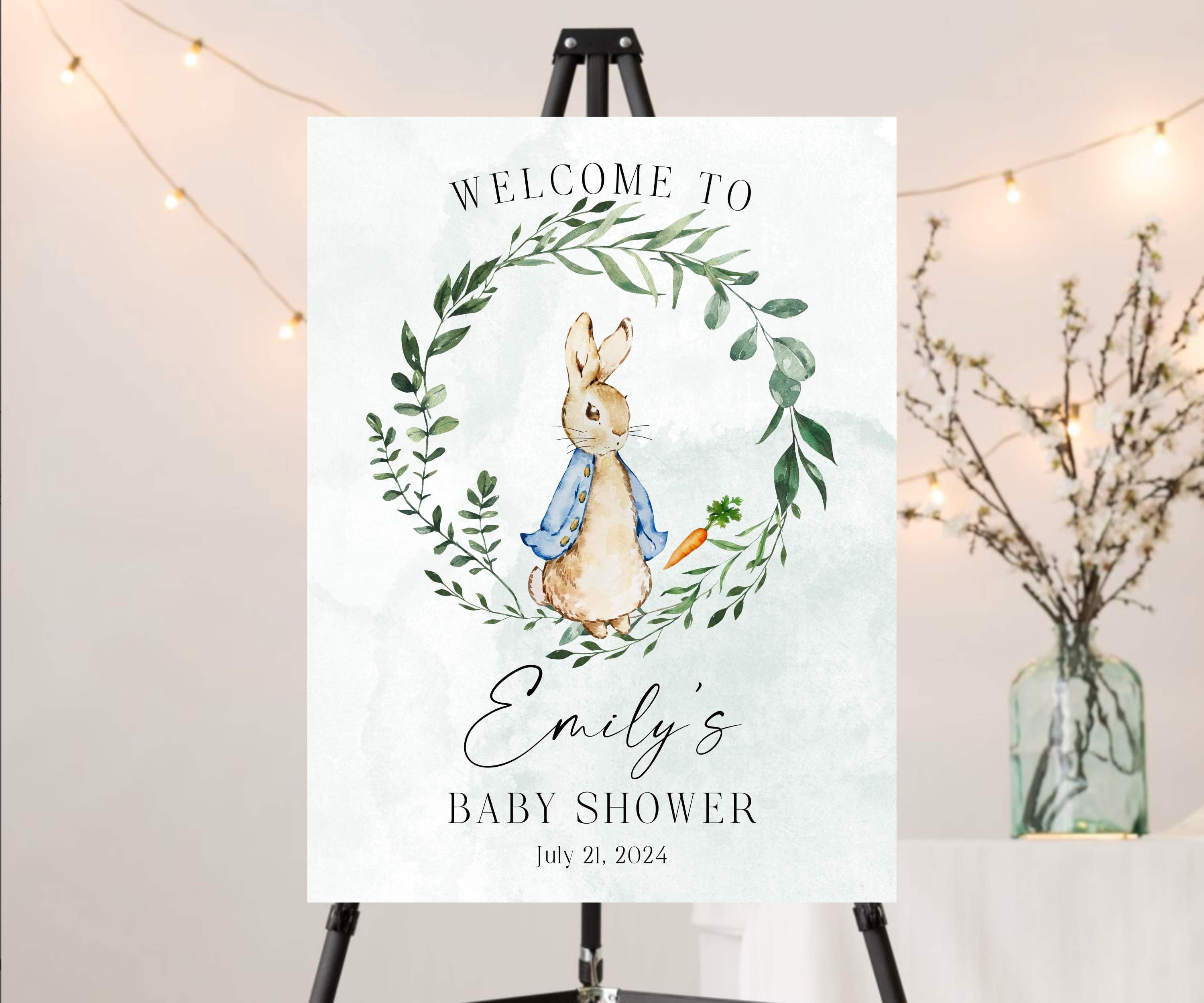 This Vintage Rabbit Baby Shower Welcome Sign adds a personalized and charming touch to your upcoming celebration. Featuring a Classic Bunny design adorned with a green watercolor wreath and a stunning green watercolor background. The elegant gender neutral design adds a classic touch, which allows you to warmly greet your guests and celebrate in style.  We can personalize your Event Signs and invitations for any occasion such as a baby sprinkle, First Birthday, "Some Bunny" themes to n