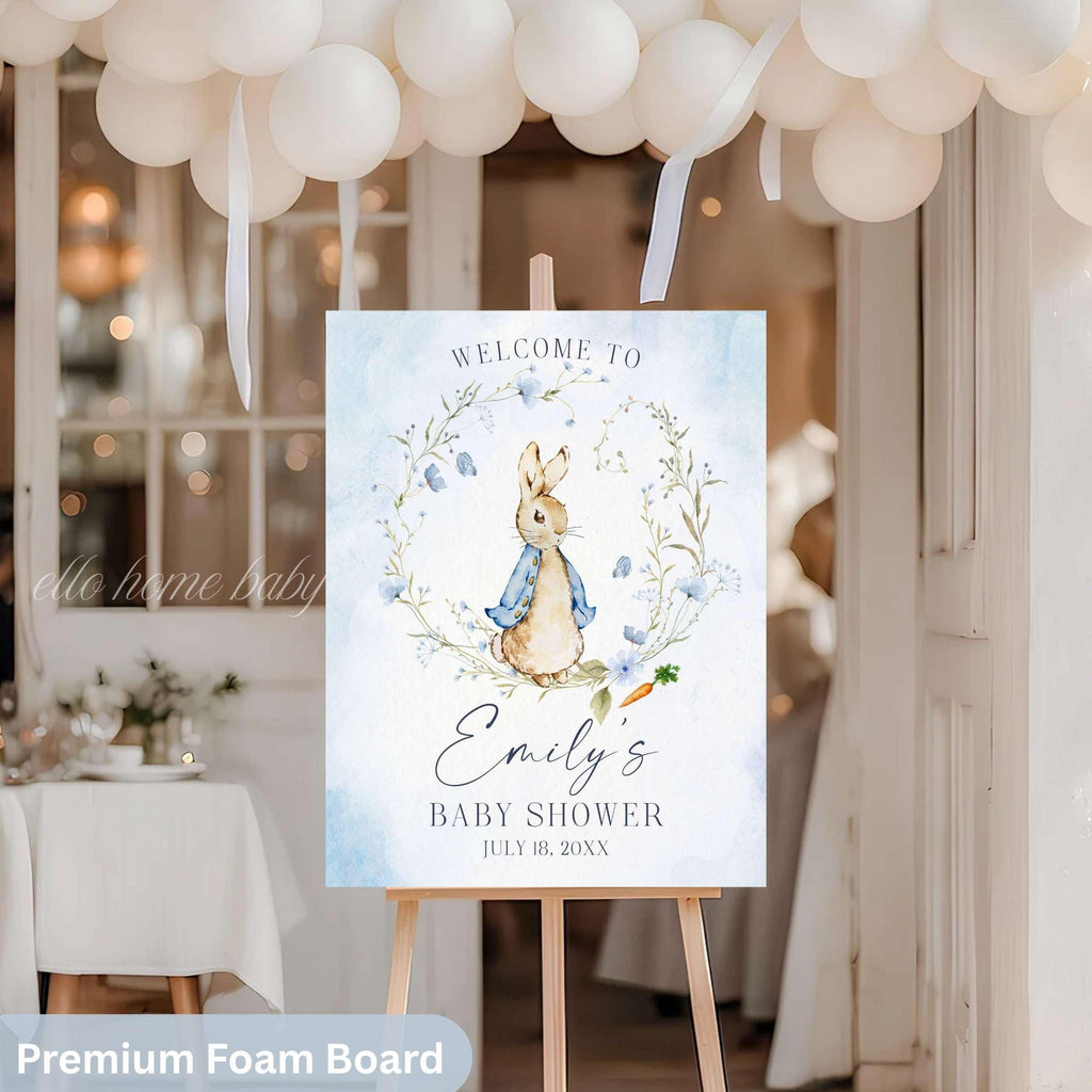 A little bunny is on the way. Some Bunny baby shower welcome sign. This Storybook Rabbit Baby Shower Welcome Sign adds a personalized charming touch to your upcoming celebration. Featuring a Classic Bunny design adorned with a blue wildflower wreath. The elegant design adds a unique touch, which allows you to warmly greet your guests. Some Bunny Rabbit Party Poster. We can personalize your Event Signs and invitations for any occasion such as a baby shower, baby sprinkle, First Birthday.