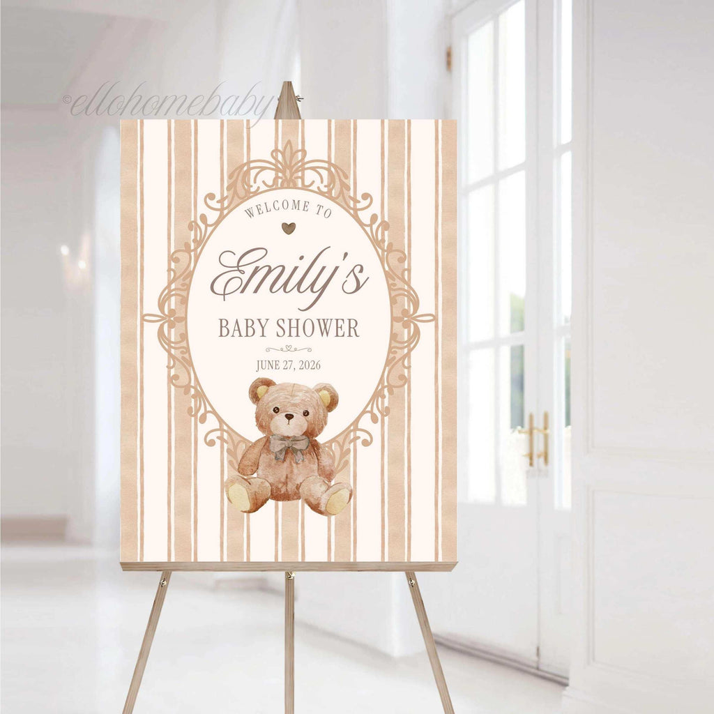 Neutral brown teddy bear baby shower welcome sign personalized with baby's name and event date featuring elegant vintage-inspired artwork.