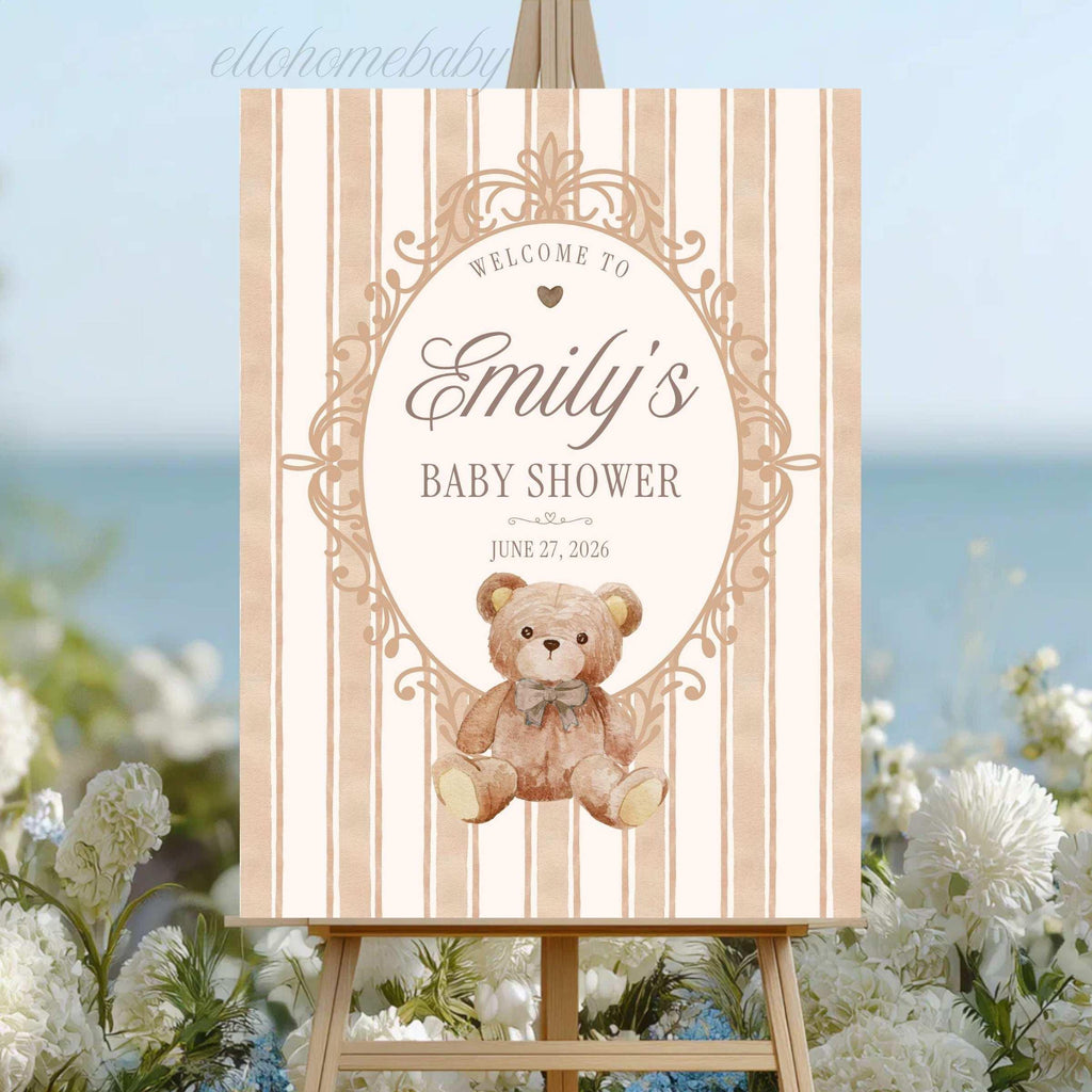 Vintage teddy bear themed baby shower welcome sign displayed on an easel with timeless neutral party décor.