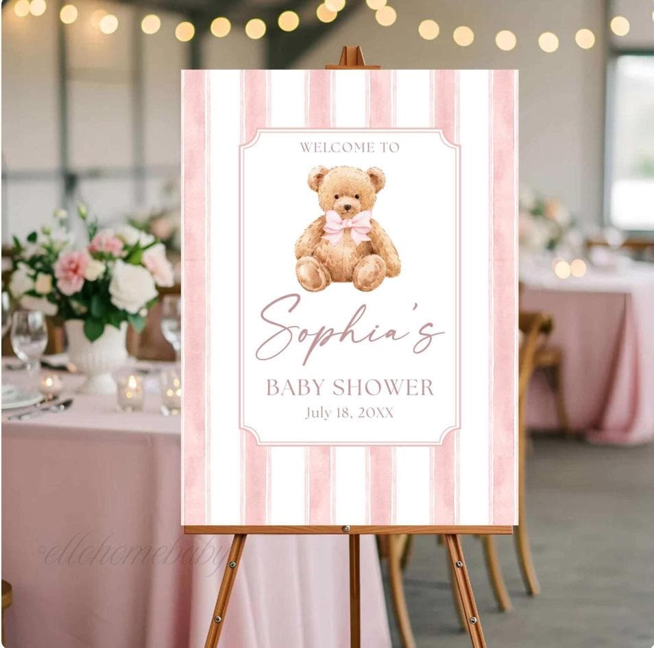 We Can Bearly Wait for you to welcome your guests with this Pretty in pink Classic Teddy Bear baby shower welcome sign. Featuring a heirloom soft teddy bear with a pink bow and vintage pink striped background mounted nicely on a wooden easel. This physical foam board is perfect for a baby boy shower, teddy bear theme party, classic storybook baby shower, or classic 'sprinkle' events.