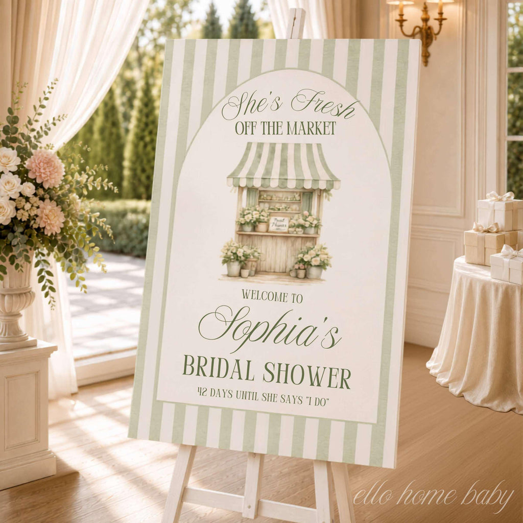 Personalized She's Fresh Off the Market bridal shower welcome sign displayed on a white easel with sage green stripes, flower market artwork, and elegant garden party decor.  Sage green flower market bridal shower welcome sign on premium foam board displayed at bridal shower entrance with natural sunlight.