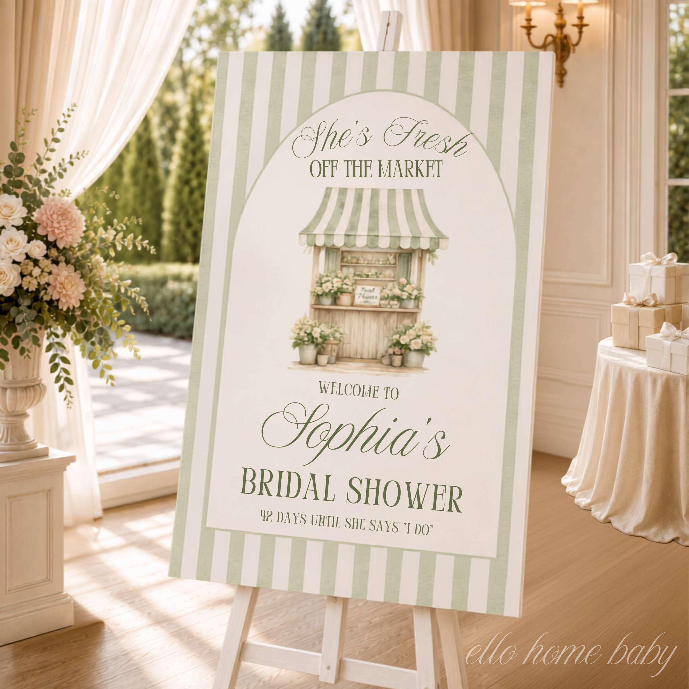 Personalized She's Fresh Off the Market bridal shower welcome sign displayed on a white easel with sage green stripes, flower market artwork, and elegant garden party decor.  Sage green flower market bridal shower welcome sign on premium foam board displayed at bridal shower entrance with natural sunlight.