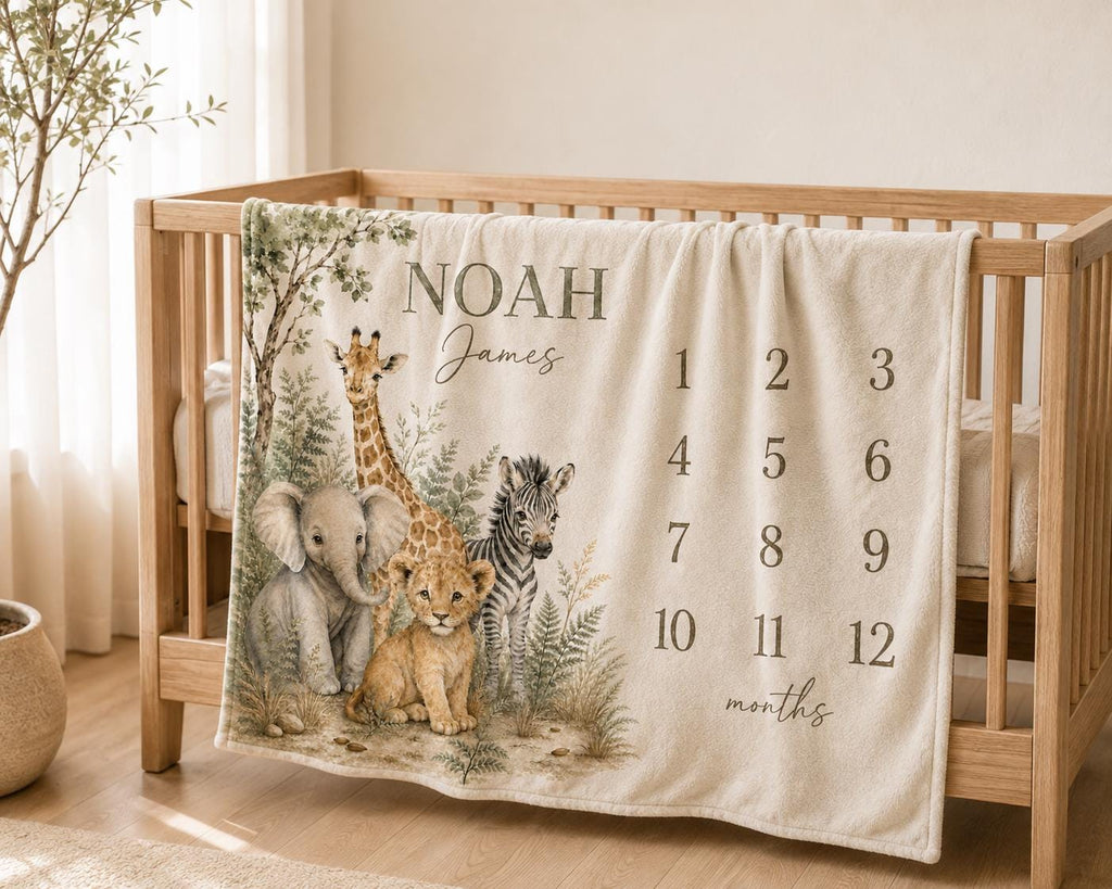 safari monthly baby blanket draped over a wood oak crib in a jungle nursery decor baby theme
