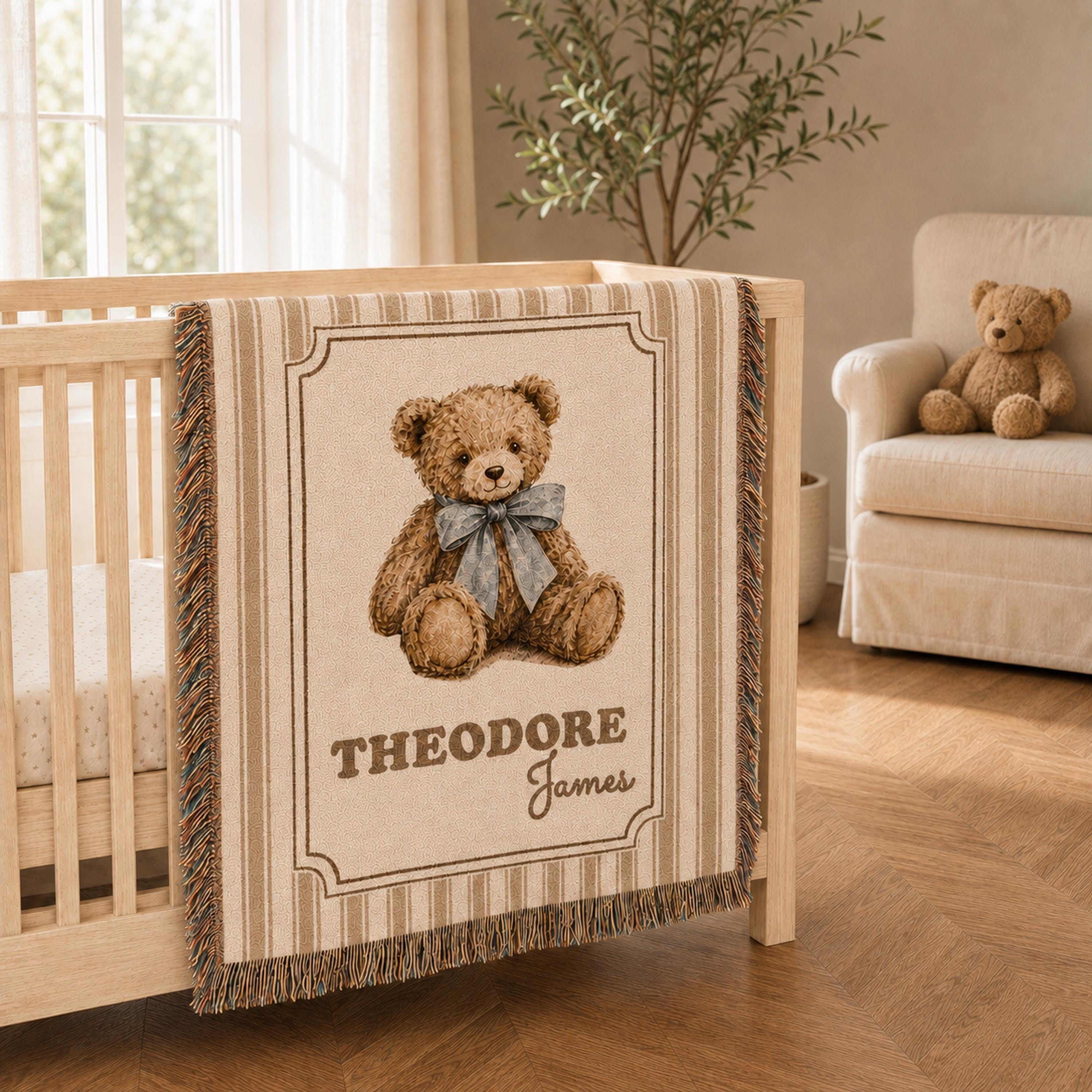 Personalized brown stripe cotton woven baby blanket draped over a light oak crib, featuring a teddy bear, blue bow, double frame, and Theodore James name design.