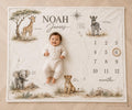 Personalized safari map milestone blanket with smiling six-month-old baby, watercolor giraffe, zebra, elephant, lion cub and monthly number grid.