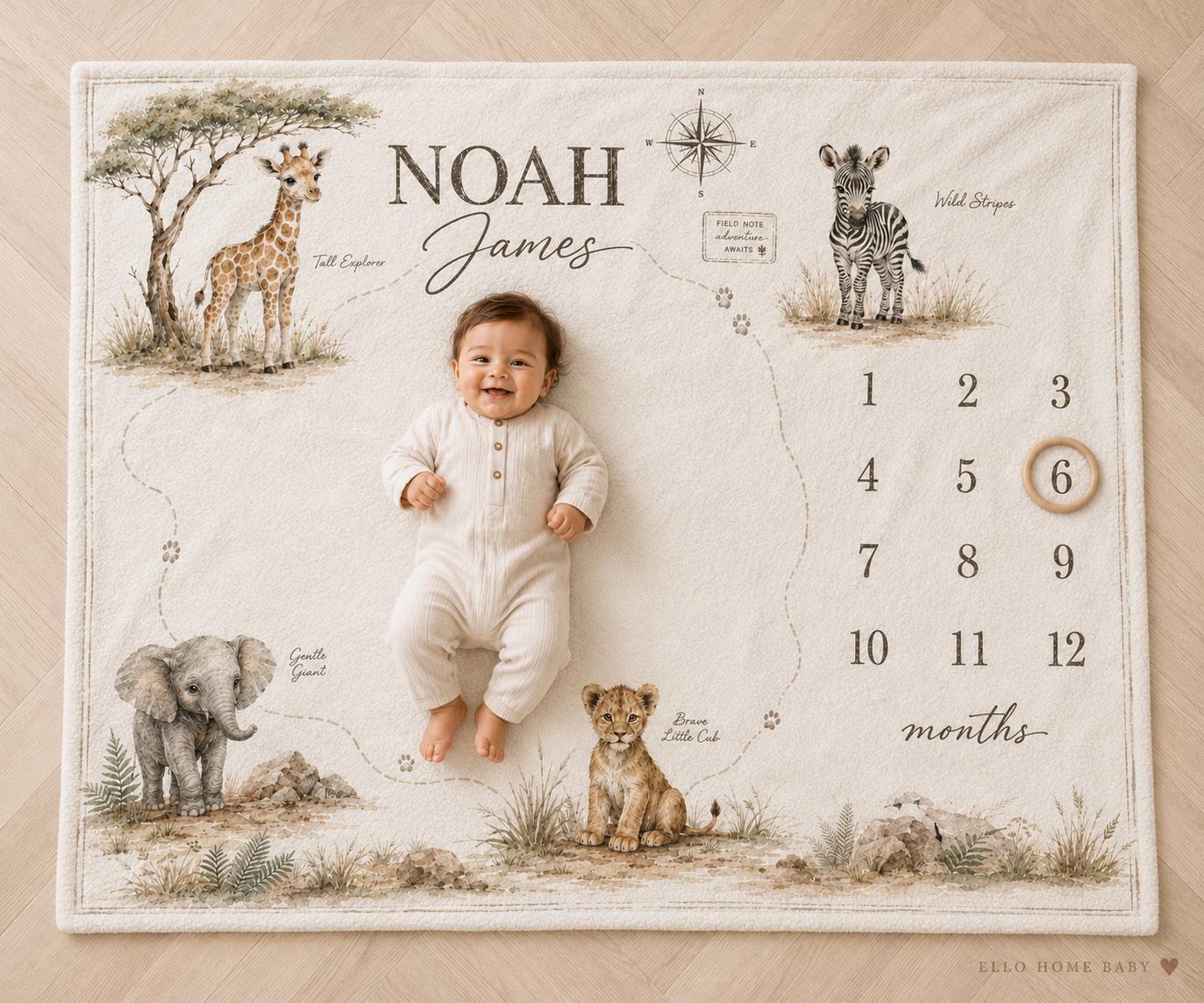 Personalized safari map milestone blanket with smiling six-month-old baby, watercolor giraffe, zebra, elephant, lion cub and monthly number grid.